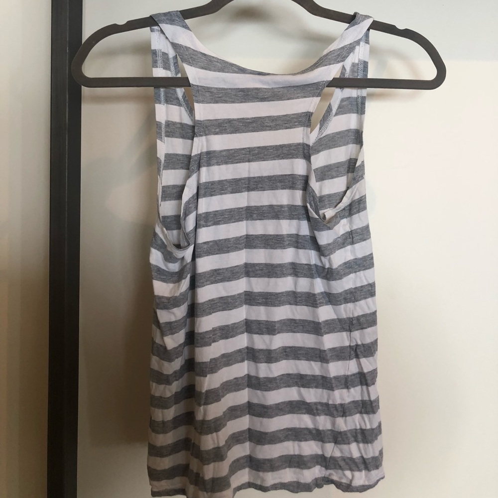 Grey and white striped tank top.